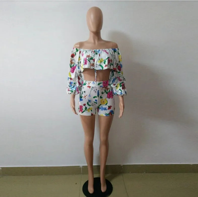 Women's two-piece pyjama set with fleece-lined sleeves and multicolour digital geometric print