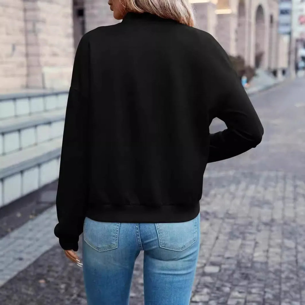 Black women's long sleeve zip jacket with faux pockets, casual style.