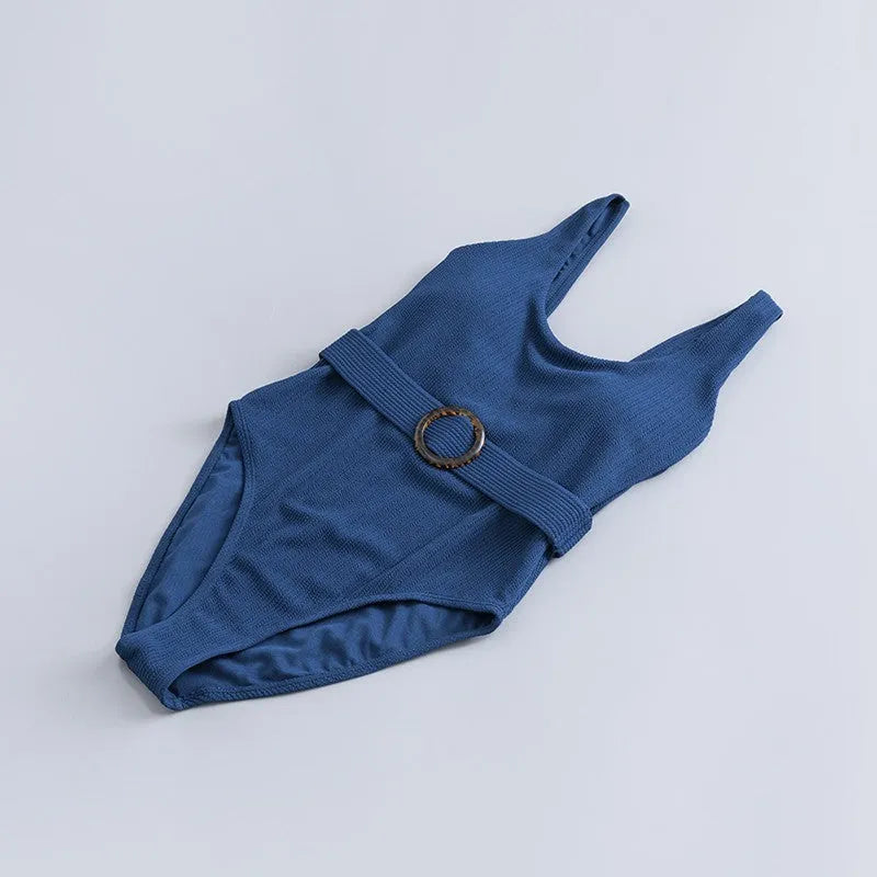 Navy blue women's slim fit one-piece swimsuit with triangle neckline and adjustable chest pads