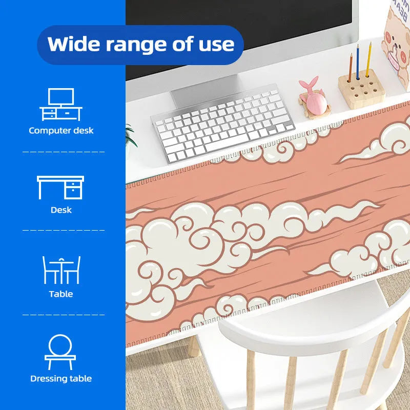Large natural rubber desk mat with cloud pattern serving as mouse pad on office desk