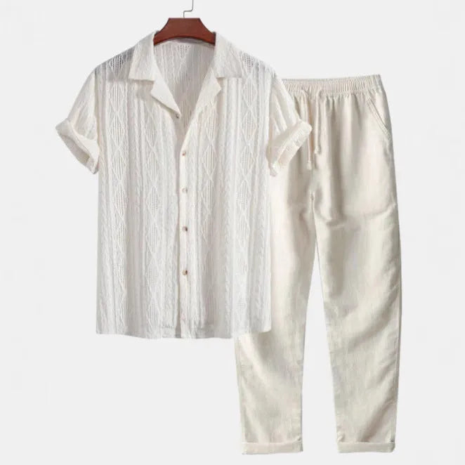 Camouflage printed short-sleeve shirt and trousers casual suit set on a hanger.