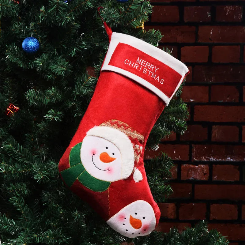 Christmas candy bag non-woven fabric decoration with elk, elderly man, or snowman design for holding stockings.