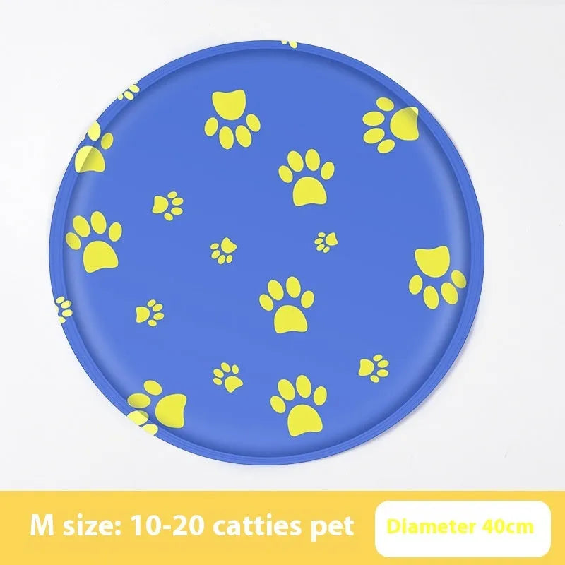 Round cartoon-themed dog cooling mat on a floor, showing gel-filled design and soft cloth cover.