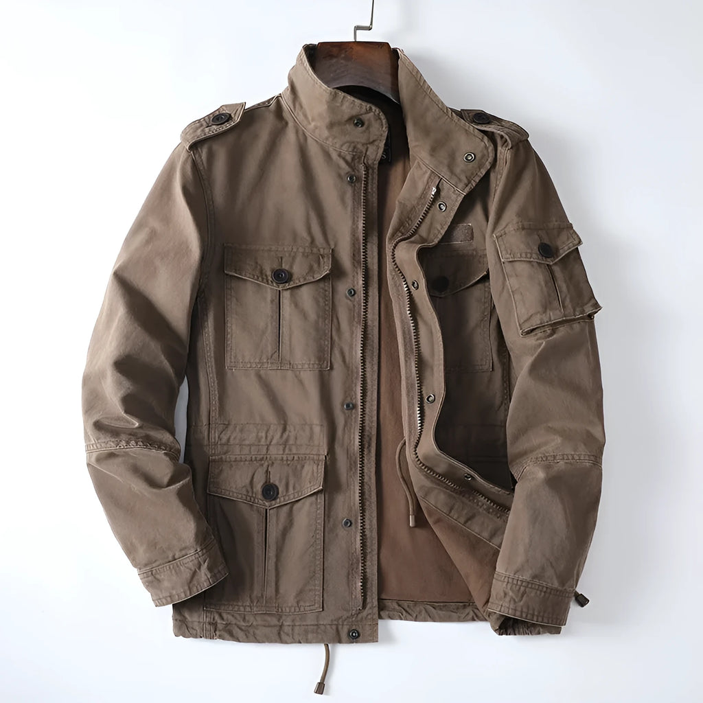 Men's loose fit cotton zip-up jacket in light brown shown on a model.
