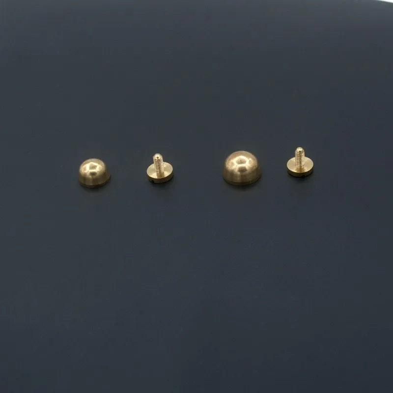 Brass decorative buckle foot nails in round and bucket styles measuring 10mm and 12mm