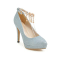 Women's blue platform stiletto heels with a pointed toe on a white background.