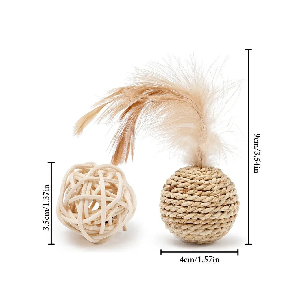 Two cat toy balls: one rattan sphere and one colourful faux feather ball with bell on a neutral background