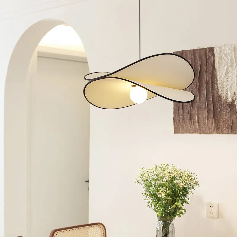 French artistic pendant light with textured fabric potato chip shade in modern simplicity style