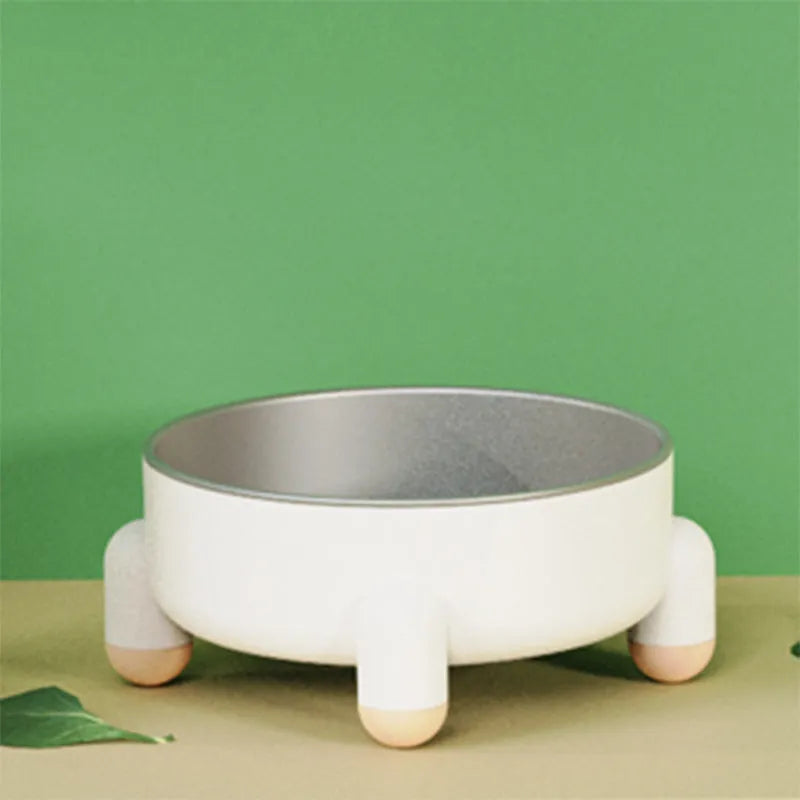 Green stainless steel pet bowl with a non-slip base and high foot for dogs and cats.