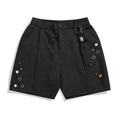 Black men's loose straight-leg shorts with a semi-elastic waist, colour button, and zip fly.