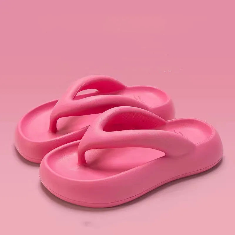 Solid colour EVA flip-flops with thick sole and decorative bow.