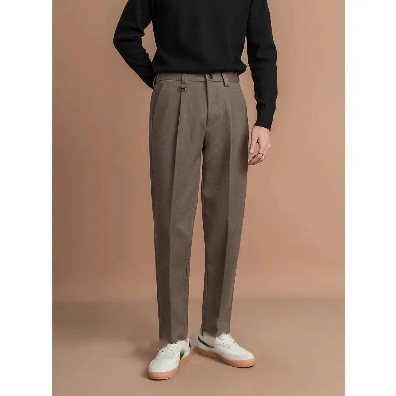 Men's straight-leg suit trousers in black, brown, grey, or khaki, shown on a model.
