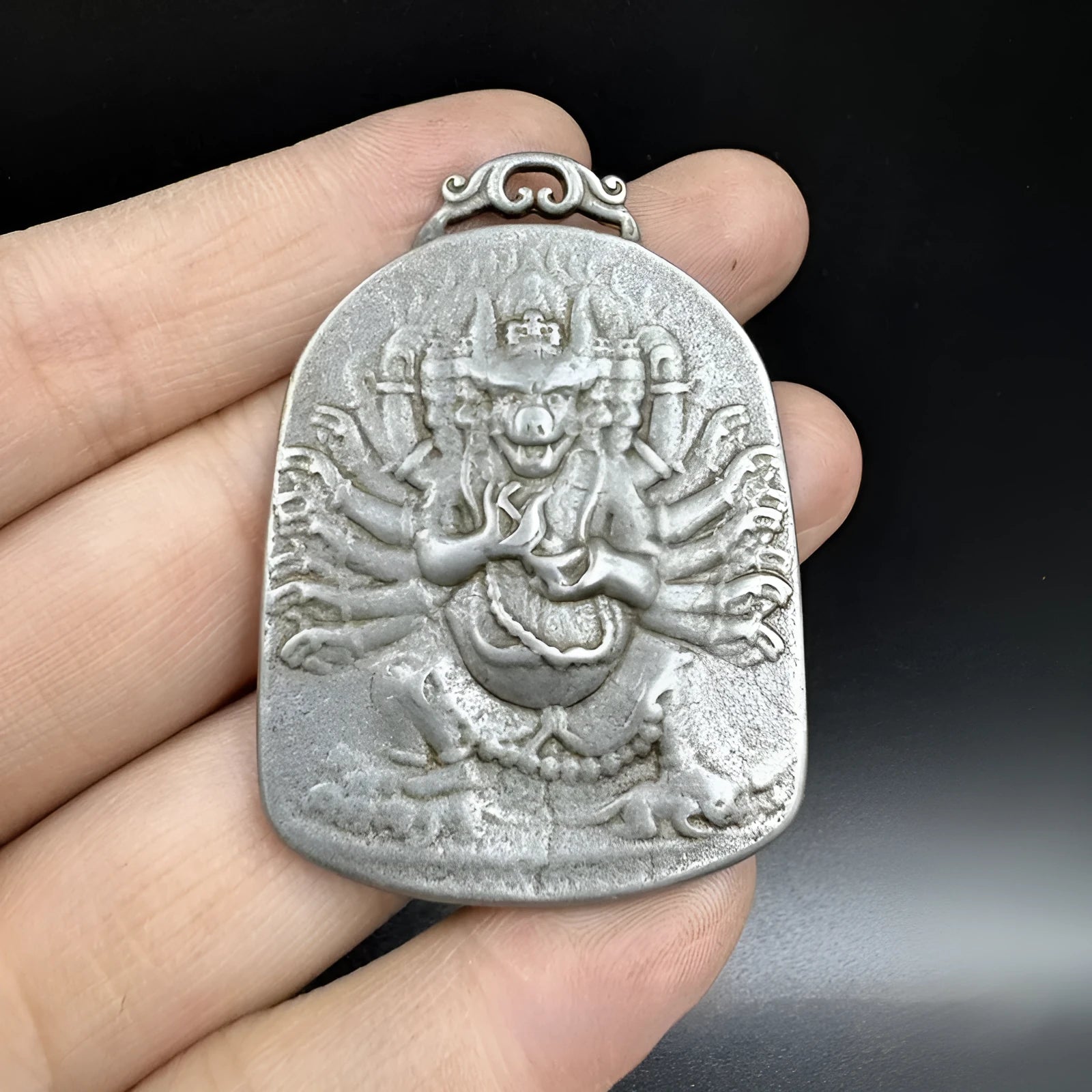 Iron metal hanging pendant with Chinese geometric design featuring Buddhist deity motif