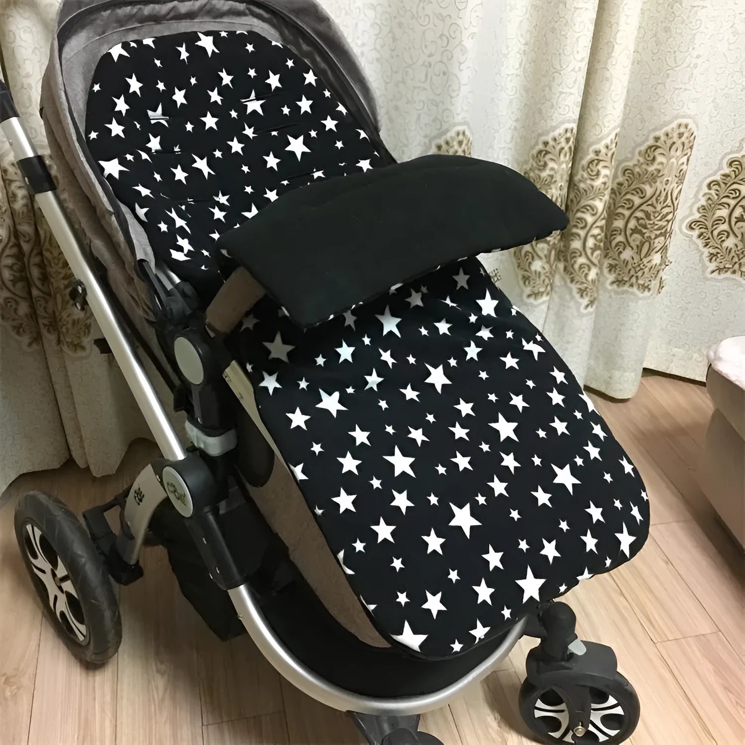 Baby stroller sleeping bag with thick filling in envelope design, shown in beige colour.