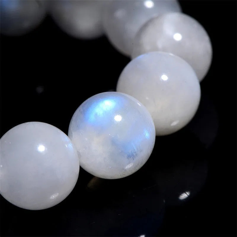 Natural blue moonlight stone round bead bracelet with geometric shapes and polished finish