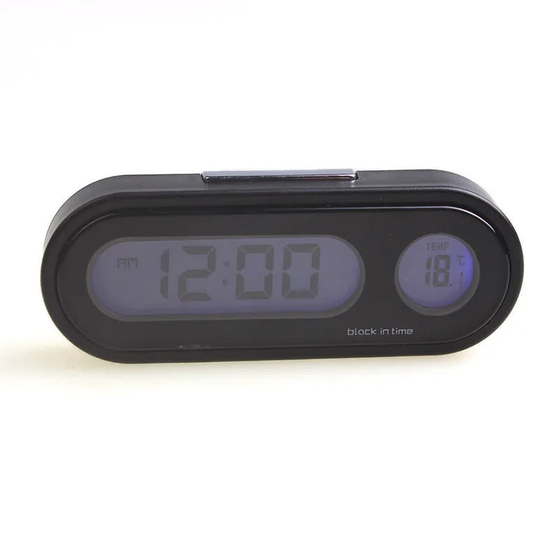 Black car electronic clock thermometer with digital LED display showing time and temperature