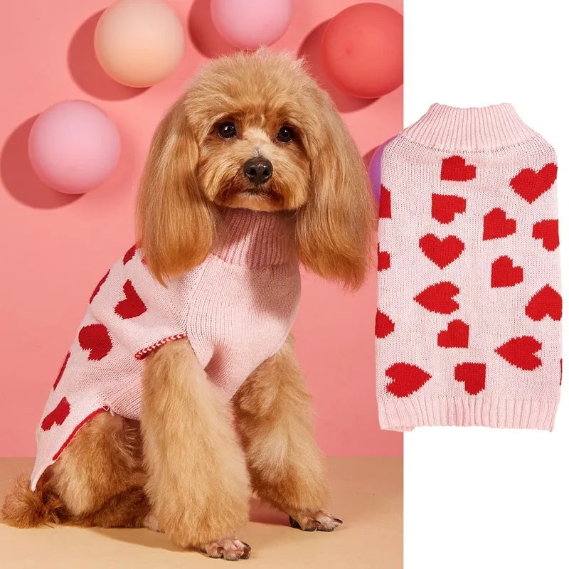 Red love heart design on a pink acrylic dog sweater for a small dog.