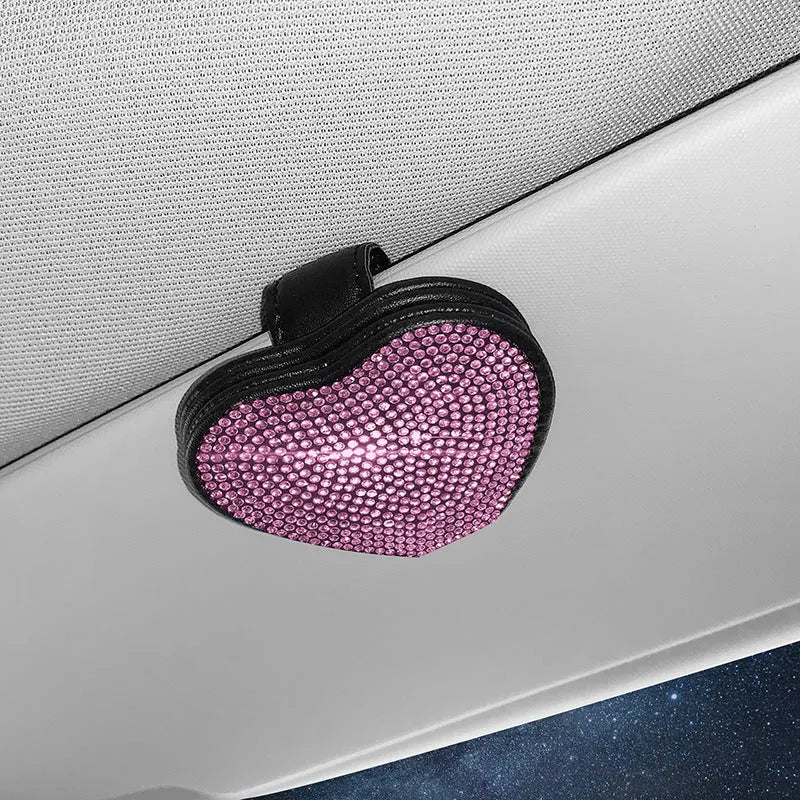 Diamond decorated PU leather magnetic clip for car sun visor holding sunglasses.