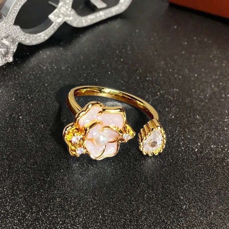 Adjustable copper ring with gourd motif, flower and bow shapes, zircon stones in six colour options