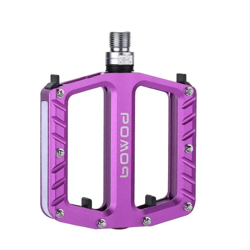 Pair of aluminium alloy bicycle pedals with integrated LED lights in a choice of colours.