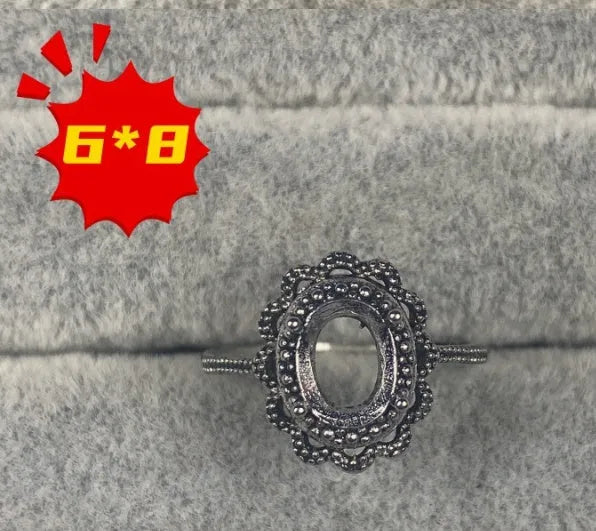 Open mouth adjustable ring with oval stone and five-pointed star ornament