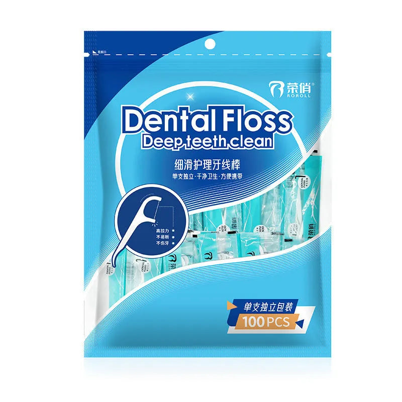 Bulk bag containing 100 individually plastic-wrapped disposable dental floss pieces on a white background.