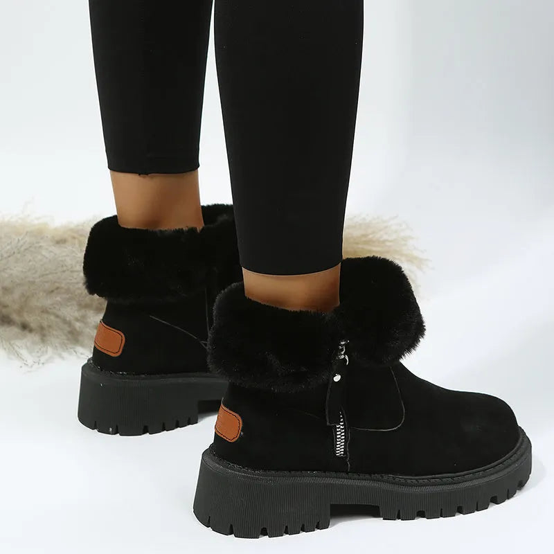 Women's black faux suede high-top snow boots with thick plush lining and a side zipper