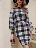 Black tight dress with lantern sleeves and printed design featuring leather stitching detail