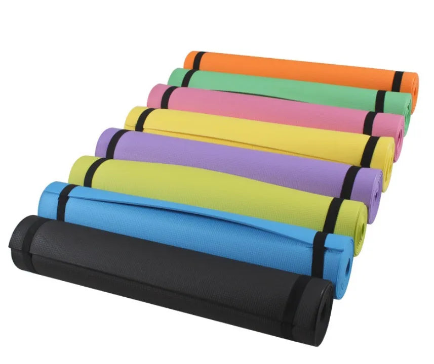 EVA fitness yoga mat in blue, showing its texture and thickness, rolled up with its OPP storage bag.