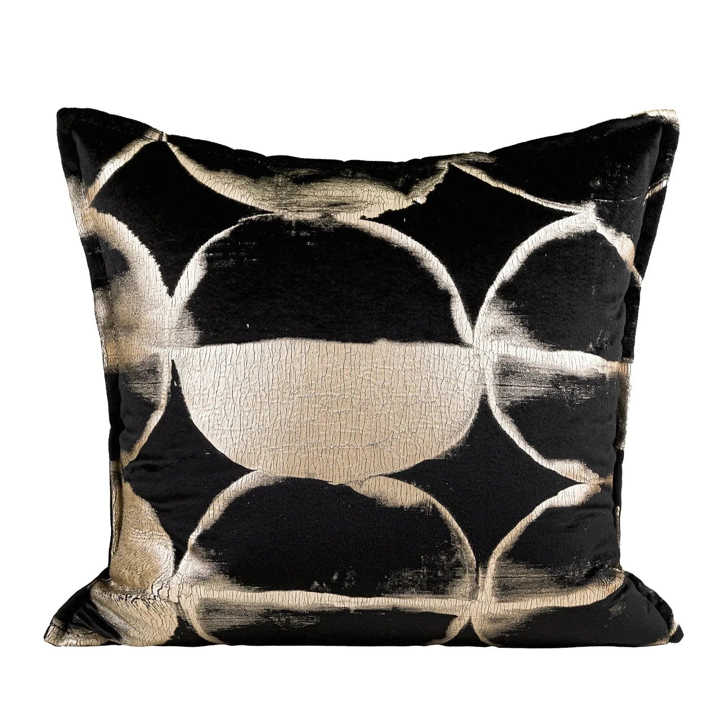 Black gold abstract patterned square decorative pillow with a soft flannel texture on a grey sofa.