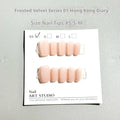 Set of frosted velvet false nails with Cat's Eye reflection in short ladder shapes on a display stand.