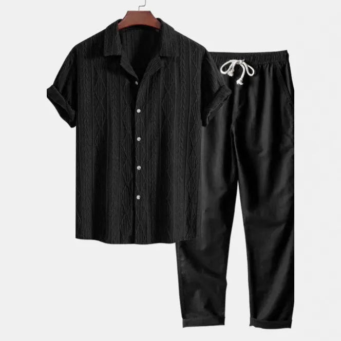 Camouflage printed short-sleeve shirt and trousers casual suit set on a hanger.