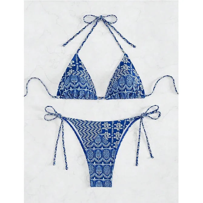 Women's green split bikini swimsuit with bandage stitching detail on the top and briefs.