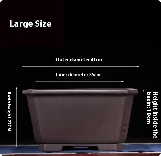 Large purple clay Chinese style flower pot for indoor bonsai or plants.