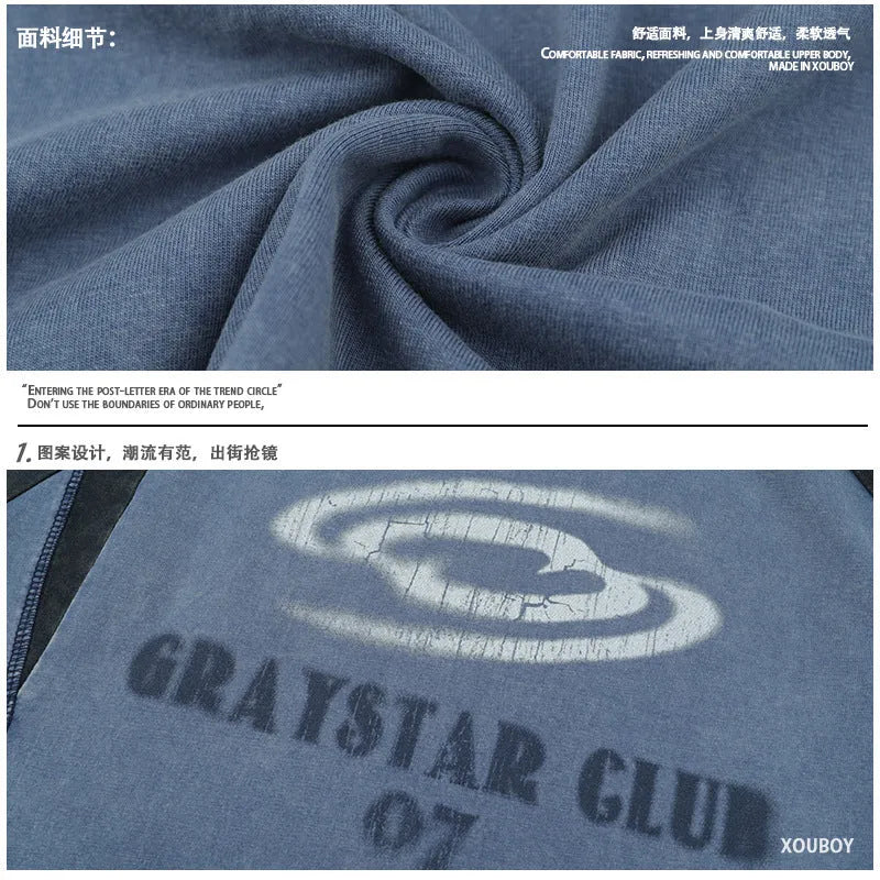 Blue men's hip hop letter print t-shirt with raglan sleeves on a hanger