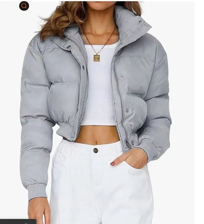 Women's loose blue polyester jacket with long sleeves and regular fit
