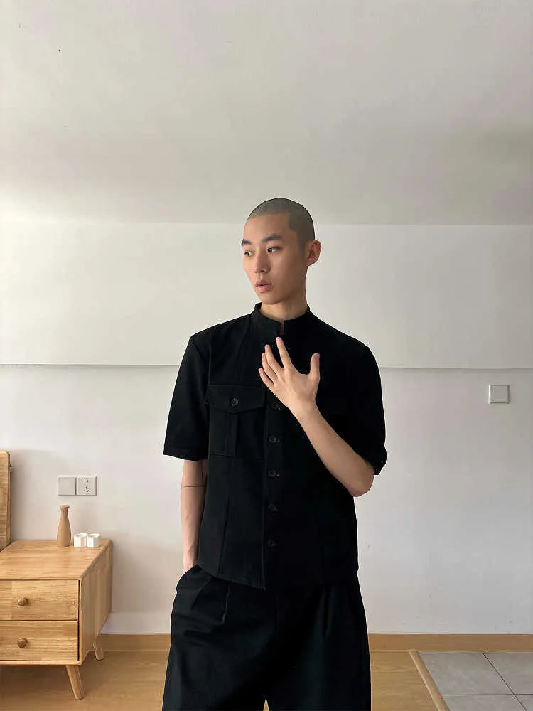 Black handmade red eye hunting shirt with half sleeves, shirt collar, and single-breasted placket.
