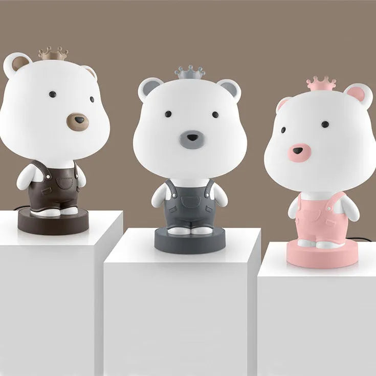 Cartoon animal table lamp in bear, cow, rabbit, or tiger design with plastic shade and LED light.