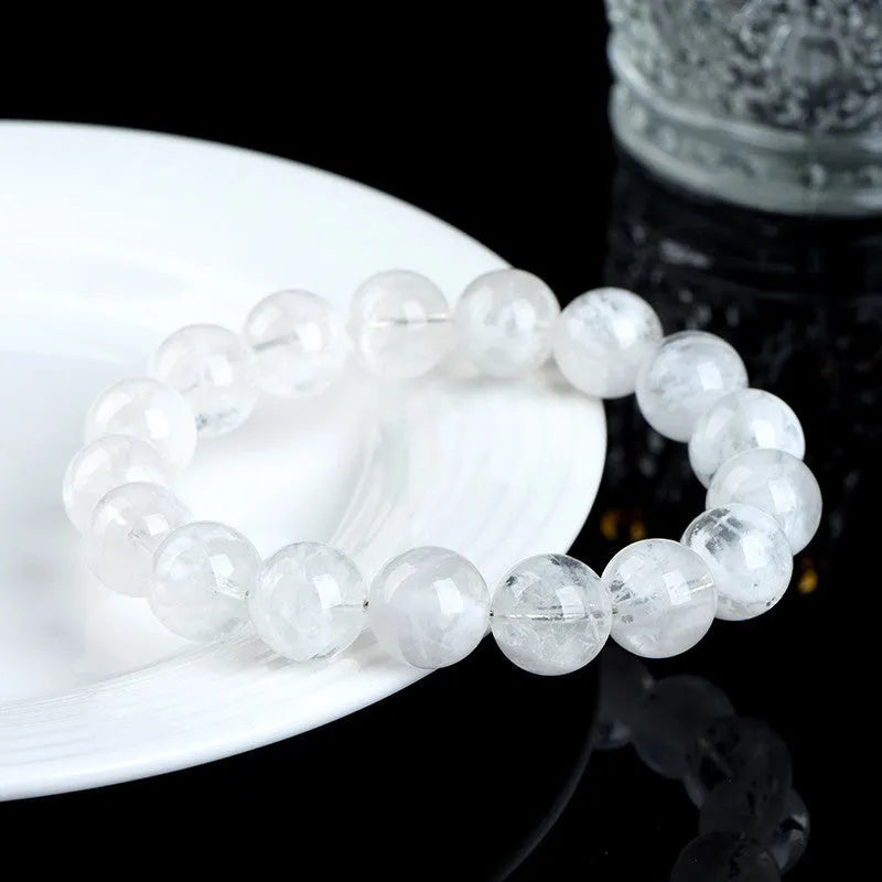 Women's geometric crystal bracelet with natural blizzard snowflake round beads in 5A or 6A colour variations