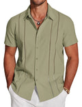Man wearing a slim fit digital print Hawaiian short sleeve shirt in a casual setting