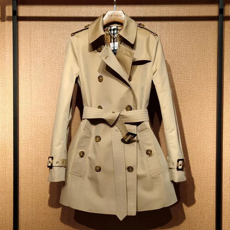Khaki women's trench coat with double-breasted British styling and flight sleeves
