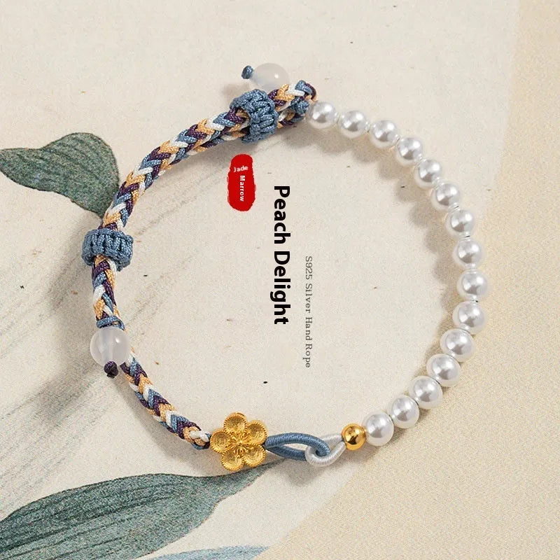 Peach-coloured Chinese flower weaving carrying strap with sterling silver electroplating and pearl details