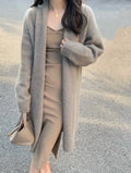 Women's V-neck knitted cardigan in khaki colour with mid-length loose fit