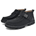 Men's black casual flat slip-on shoes with visible handmade stitching on the PU leather upper.
