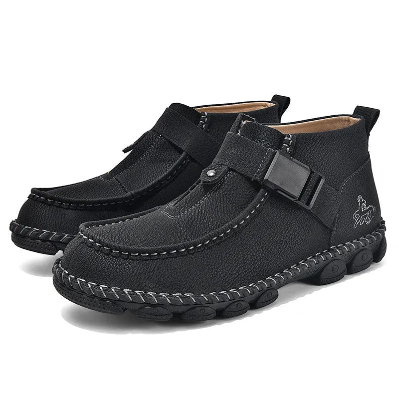 Men's black casual flat slip-on shoes with visible handmade stitching on the PU leather upper.