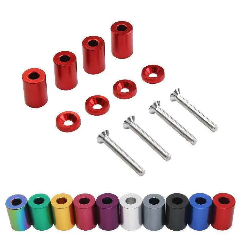 Aluminium engine cover spacer pack with screws and nuts in black, blue, or red.