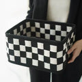 Checkerboard woven grey felt storage basket with folded sides showing its 37x29x19.5cm size.