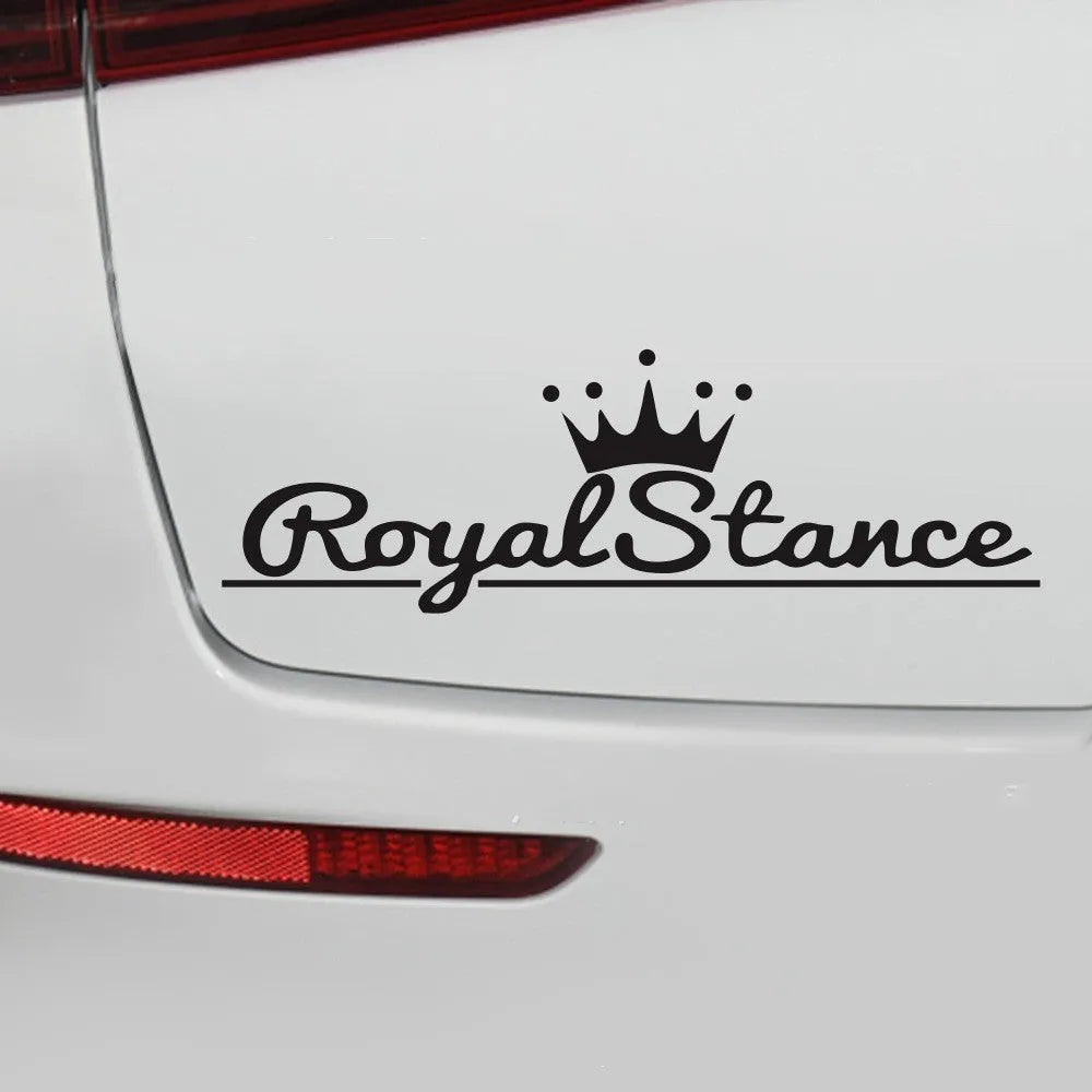 Reflective crown-shaped car sticker on a vehicle window, showing black, white, and colourful design options.