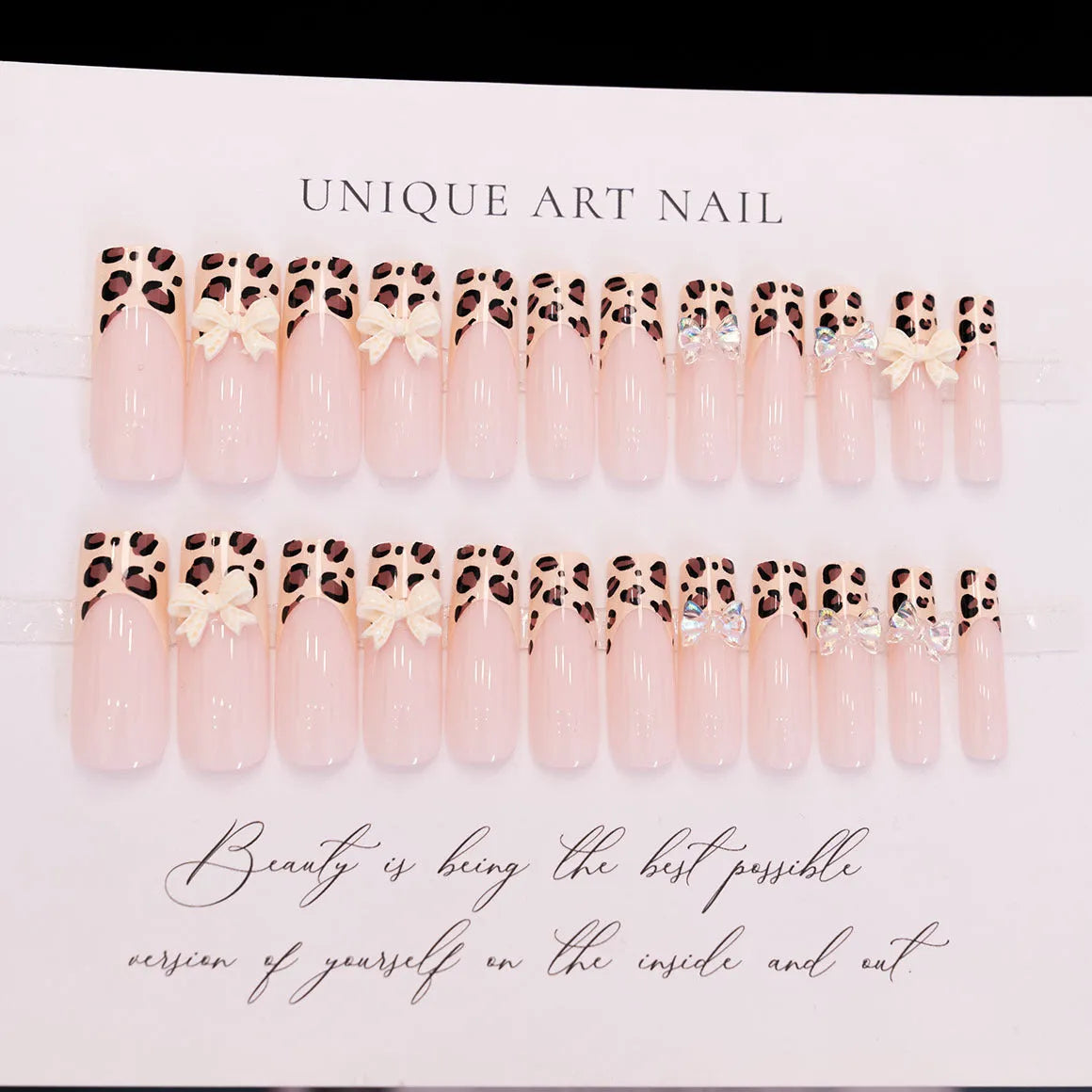 Leopard print butterfly designs on plastic false nails in WM296 colour for ladies manicure
