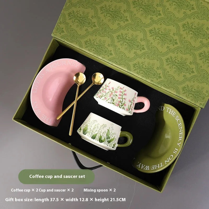 Ceramic coffee cup and saucer set for two with stirring spoons in Campanula design